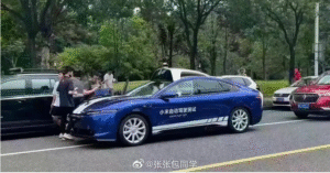Screenshot-2023-10-18-at-09-04-57-Xiaomis-bizarre-proposal-for-wireless-charging-of-EVs