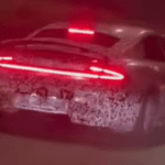 Screenshot-2023-11-20-at-15-50-34-Xiaomi-SU7-in-heavy-camo-escaping-paparazzi-on-highway-in-China