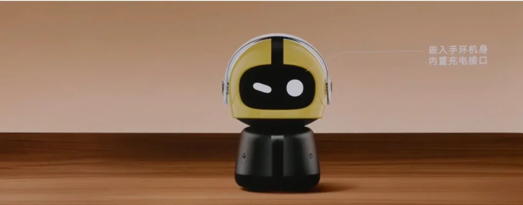 Transform your Xiaomi Smart Band into a smart display with the new Robot Table Dock! Voice assistant, Bluetooth speaker, and more.